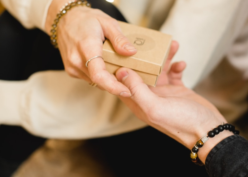 person holding gold iphone 6