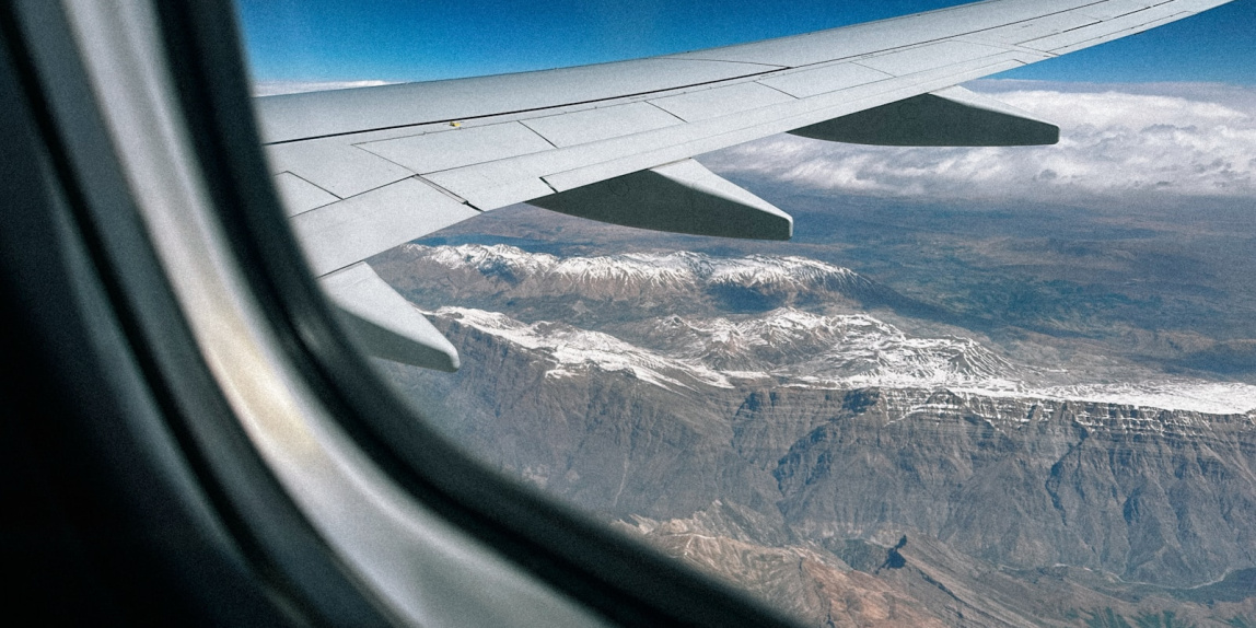 a view of a mountain range from an airplane window
