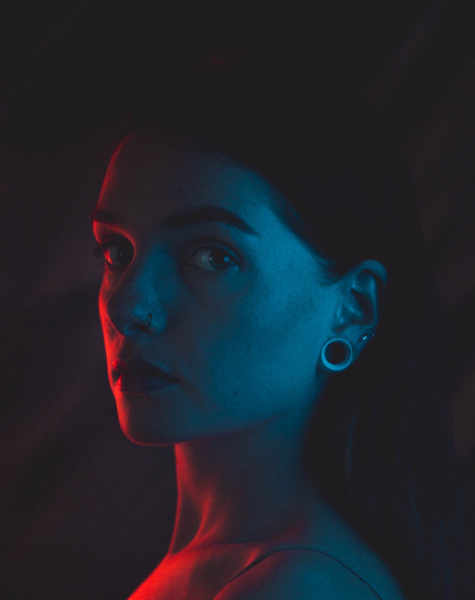 portrait photography of woman looking to the side